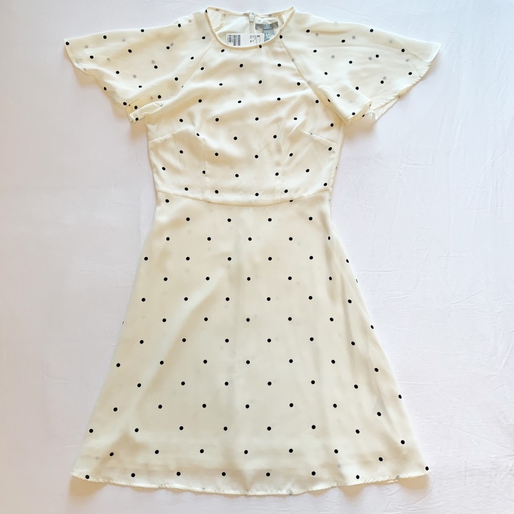 White and Black Polka Dot Dress with Loose Flutter Sleeves